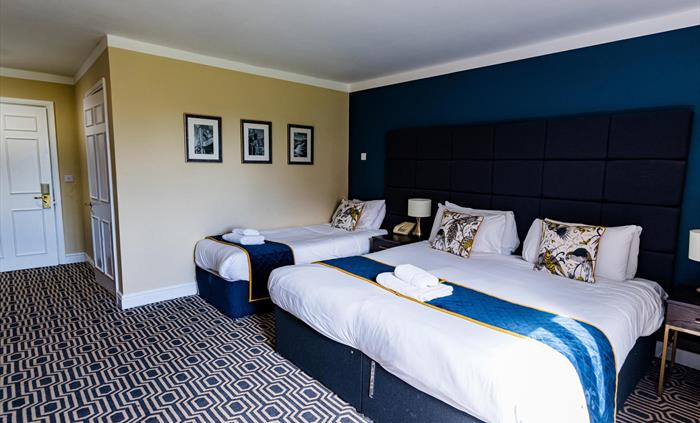 Superior Family room with garden view at Rossett Hall Hotel.